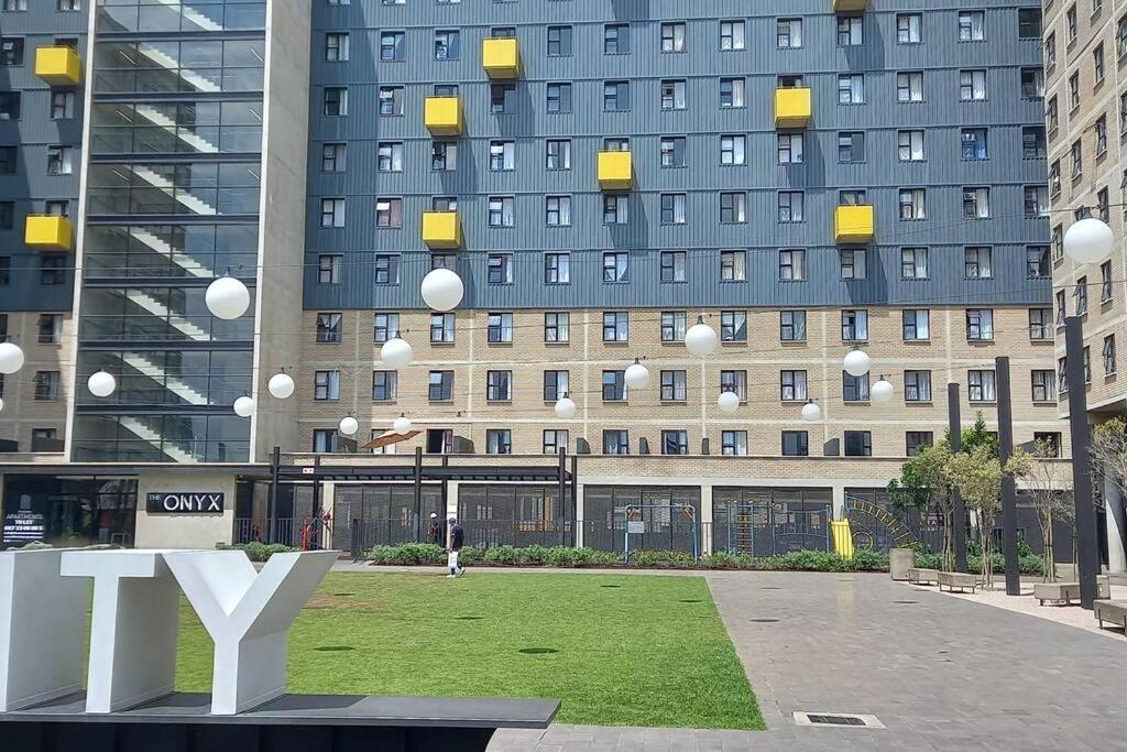 Chic Maboneng Balcony With Stunning City Views