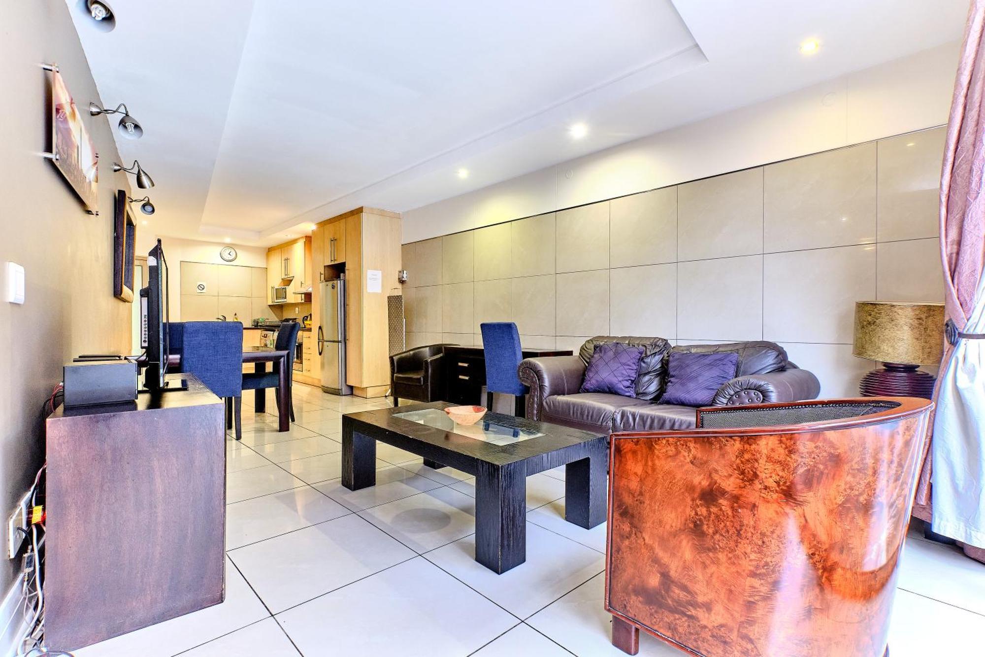 Apartamento Sandton Comfort At Hydro Joanesburgo