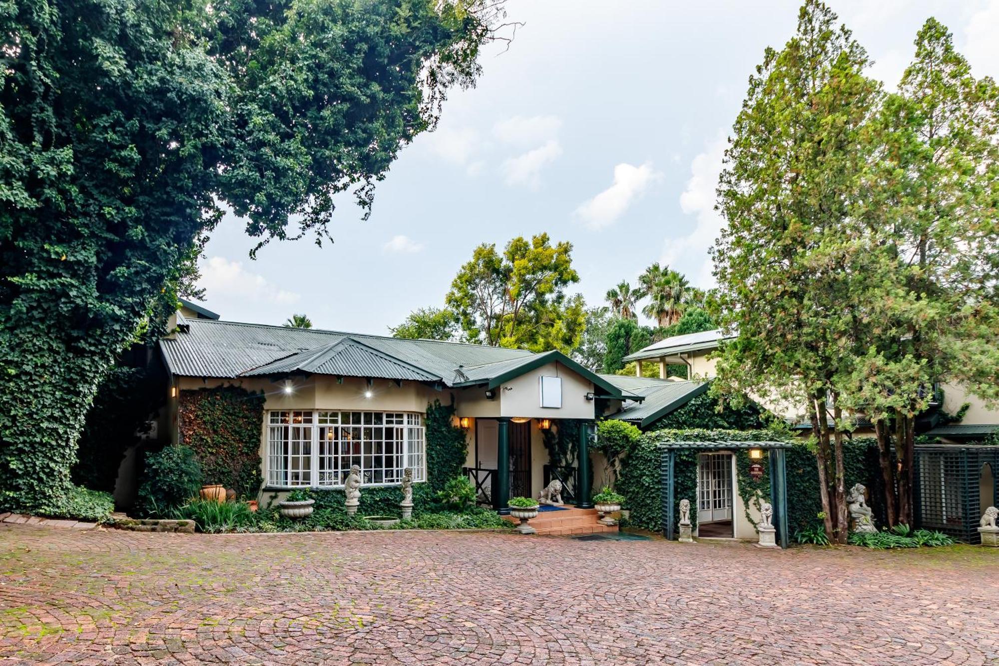 Sandton Amar Boutique Nhà khách *