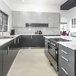 Private Modern 10 Bdrm Home Tucked Away In Sandton