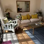 Charming Cottage In Lush Melrose Garden